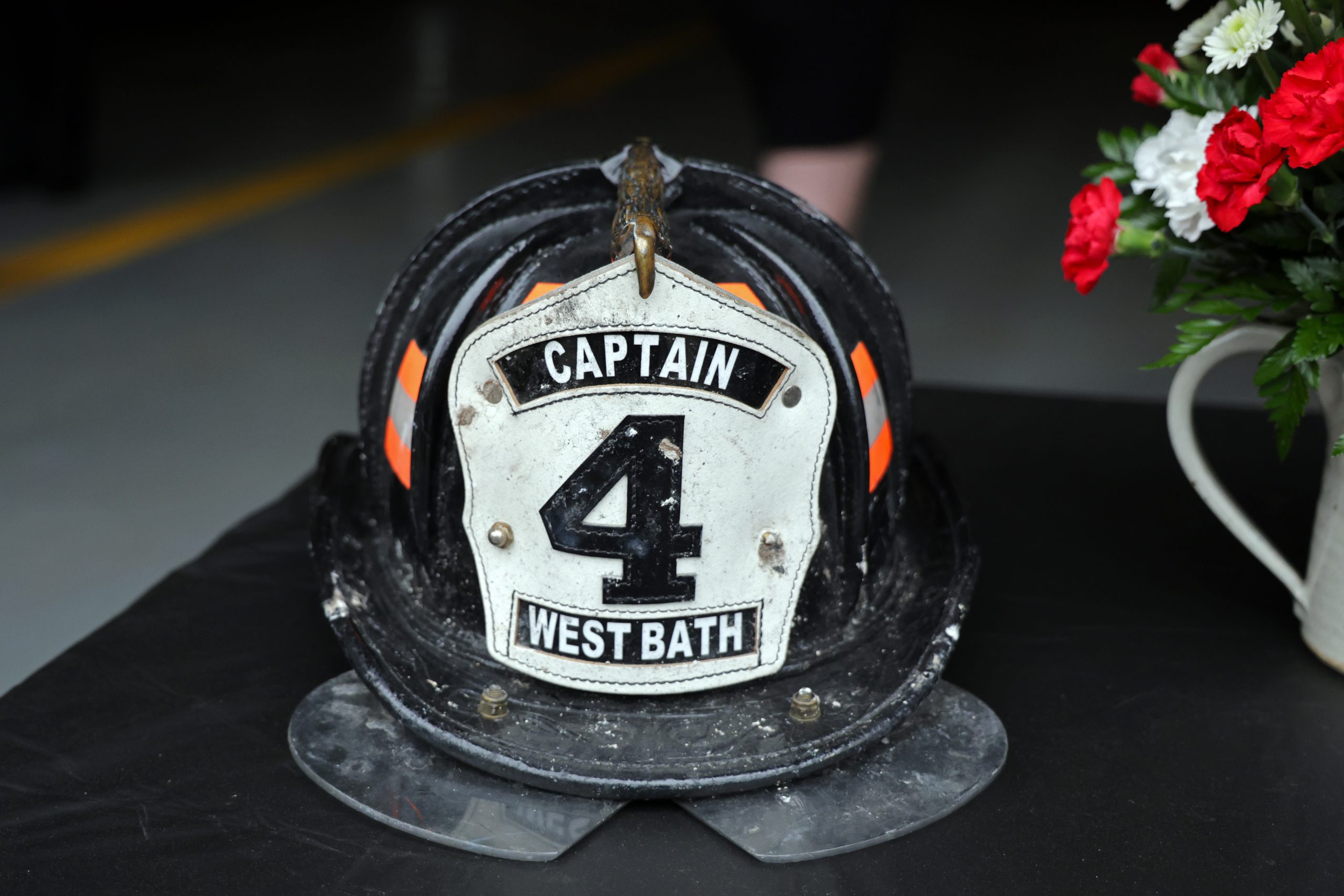 At memorial for fire administrator, stories emerge of a calm leader — and his teenage heroics